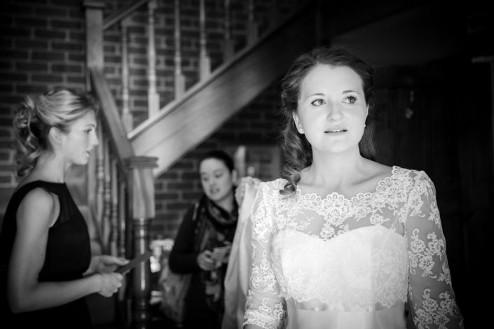 Bride waits for cars to arrive