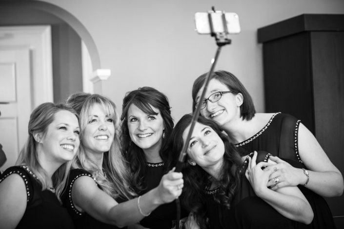 Bridesmaids posing for selfies