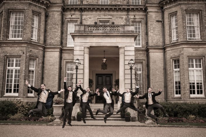 Group photo men leaping