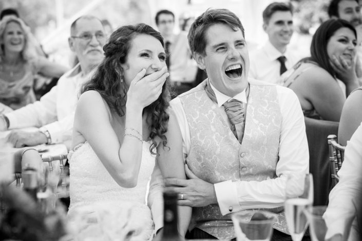 Bride & Groom Laughing during speeches
