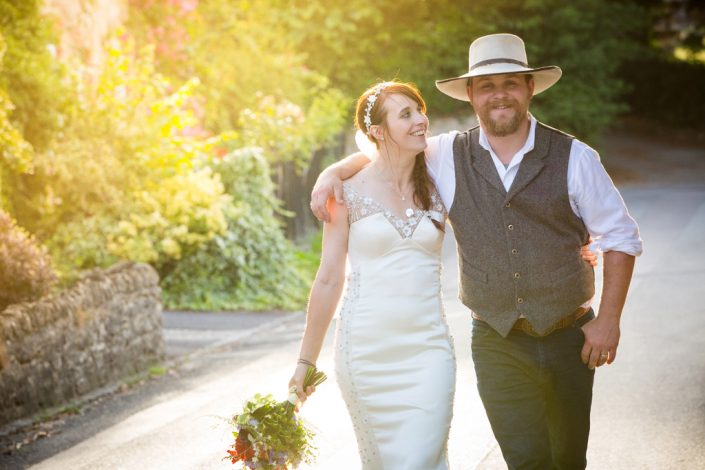 Cowboy Groom & Bride walking up Country Lane