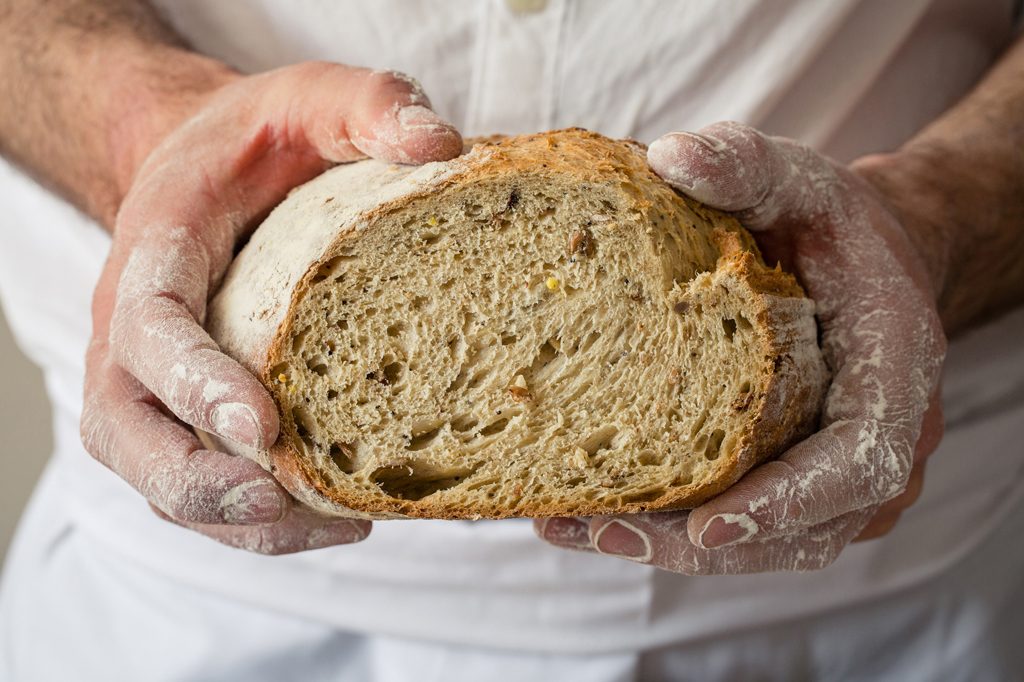 Baker holding bread, Hobbs House Bakery, Tom Herbert, Fabulous Baker Brothers