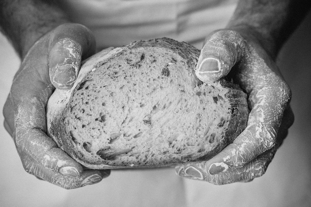 Baker holding bread, Hobbs House Bakery, Tom Herbert, Fabulous Baker Brothers