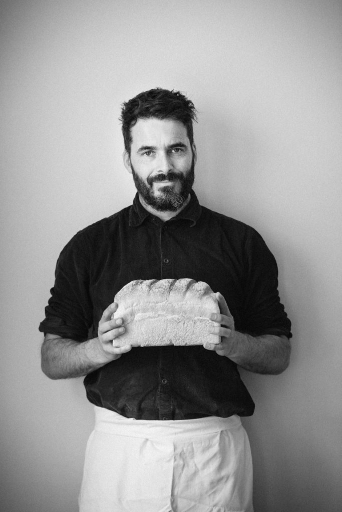 Baker holding loaf of bread, Hobbs House Bakery, Tom Herbert, Fabulous Baker Brothers