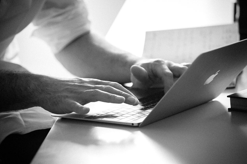 Mans hands with macbook, Hobbs House Bakery, Henry Herbert, Fabulous Baker Brothers