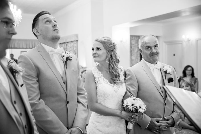 Black & White image of Bride & Groom during Service