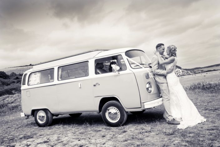 Bride & Groom on Beach with Campervan