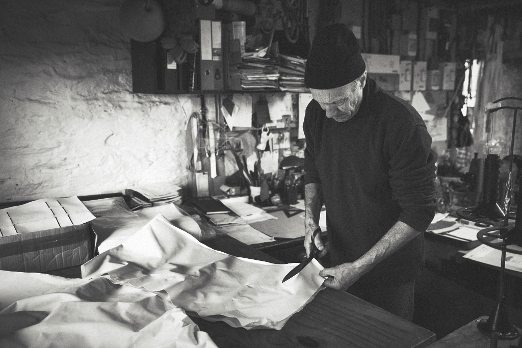 traditional sailmaker at work